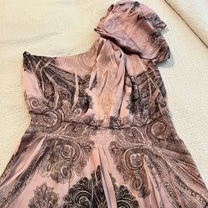 Asymmetrical, one shoulder blouse.